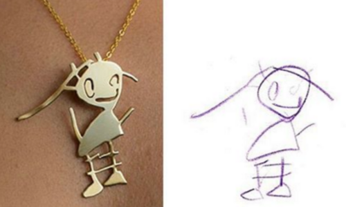 gold necklace featuring child's drawing superimposed next to the actual drawing