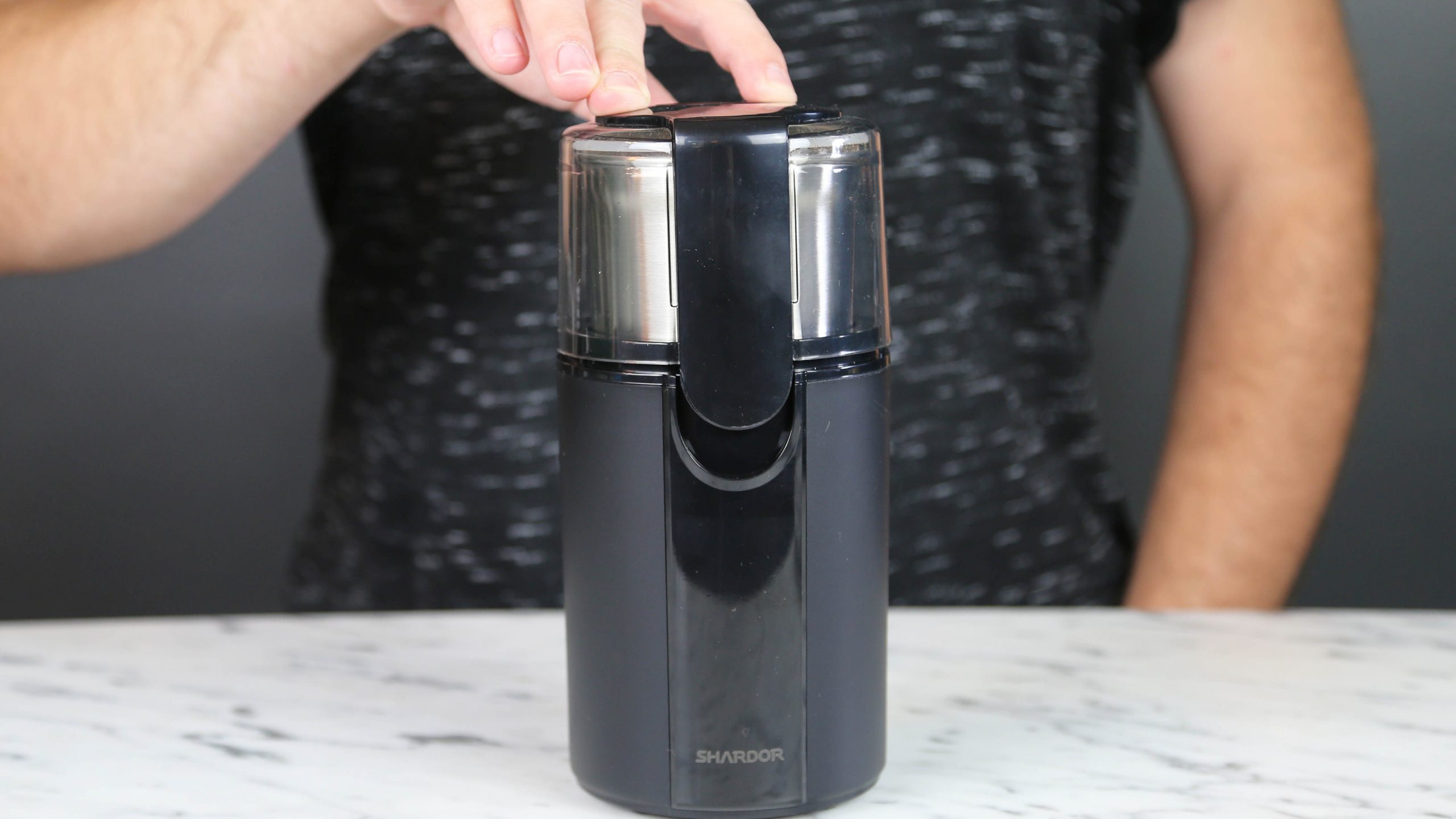 Aigostar Coco- Electric Coffee Grinder with Stainless Steel Blades | Grinds Coffee Beans Spices Nuts and Grains | One-Touch 60g Black