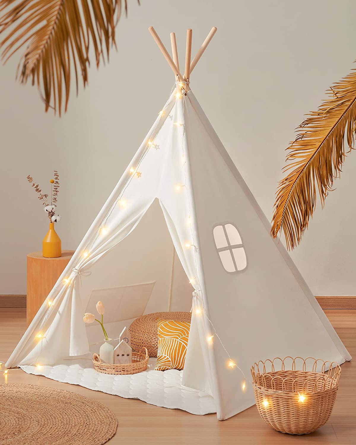 https://www.dontwasteyourmoney.com/wp-content/uploads/2021/11/tiny-land-string-lights-padded-matt-teepee-kids-tent.jpg