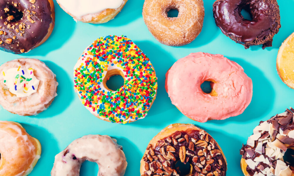 Assorted donuts on blue background