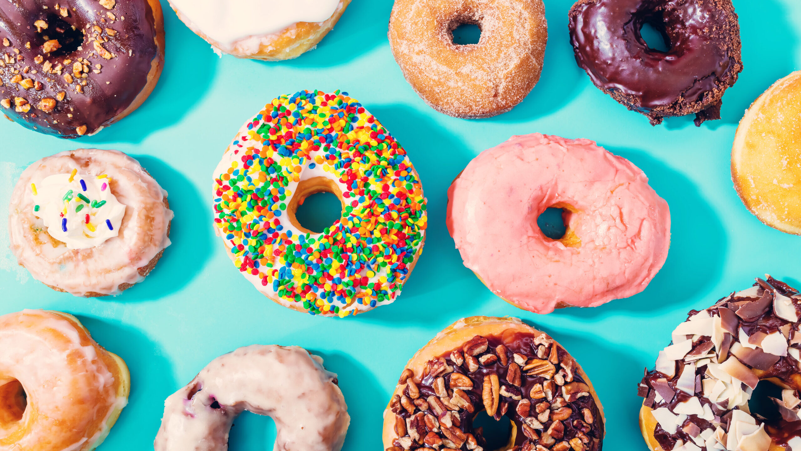 Assorted donuts on blue background