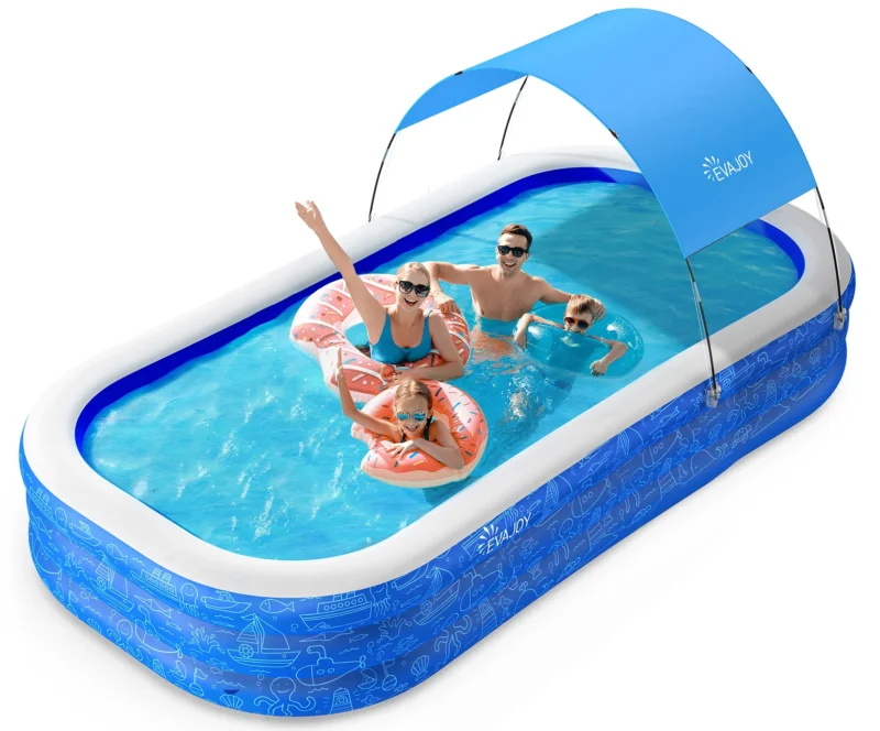 family in large inflatable pool with canopy