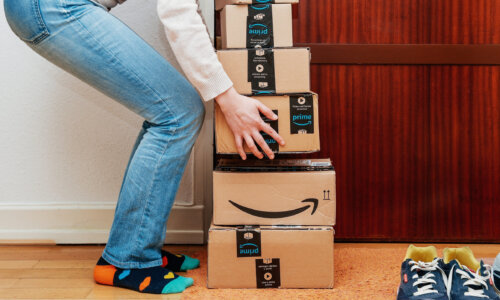 Woman picks up multiple Amazon packages