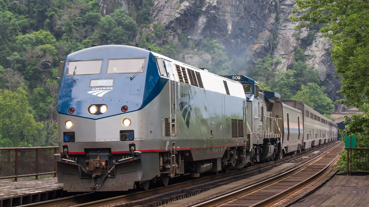 Train traveling on tracks