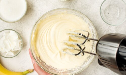 person using a mixer to make heavy cream